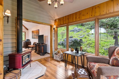 If you want beautiful Swan Mountain views from almost every room on  in Montana - for sale on GolfHomes.com, golf home, golf lot