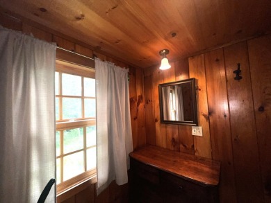 HERE'S A CHANCE to own a cabin on the Saddleback Mountain Road on Evergreen Golf Club in Maine - for sale on GolfHomes.com, golf home, golf lot