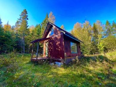 HERE'S A CHANCE to own a cabin on the Saddleback Mountain Road on Evergreen Golf Club in Maine - for sale on GolfHomes.com, golf home, golf lot