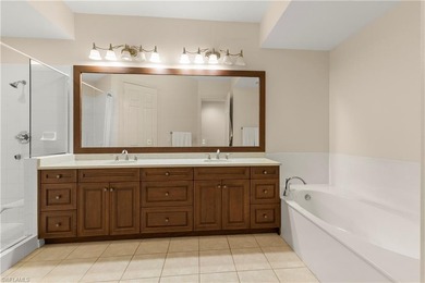 Don't miss this opportunity!!! 1st-floor end-unit with Pristine on Pelican Marsh Golf Club in Florida - for sale on GolfHomes.com, golf home, golf lot