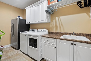 This beautiful home in the gated Grand Harbor community offers a on The Patriot Golf Club At Grand Harbor in South Carolina - for sale on GolfHomes.com, golf home, golf lot