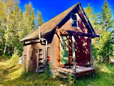 HERE'S A CHANCE to own a cabin on the Saddleback Mountain Road on Evergreen Golf Club in Maine - for sale on GolfHomes.com, golf home, golf lot