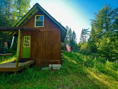 HERE'S A CHANCE to own a cabin on the Saddleback Mountain Road on Evergreen Golf Club in Maine - for sale on GolfHomes.com, golf home, golf lot