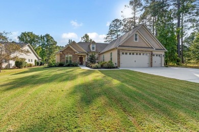 This beautiful home in the gated Grand Harbor community offers a on The Patriot Golf Club At Grand Harbor in South Carolina - for sale on GolfHomes.com, golf home, golf lot