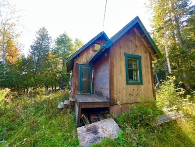 HERE'S A CHANCE to own a cabin on the Saddleback Mountain Road on Evergreen Golf Club in Maine - for sale on GolfHomes.com, golf home, golf lot