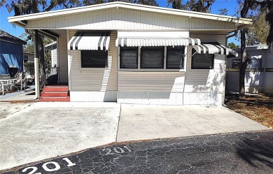 Best value in this park! This vibrant 55+ community provides on River Run Golf Links in Florida - for sale on GolfHomes.com, golf home, golf lot