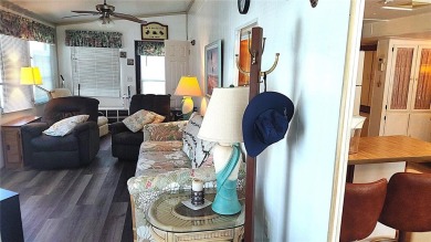 Best value in this park! This vibrant 55+ community provides on River Run Golf Links in Florida - for sale on GolfHomes.com, golf home, golf lot
