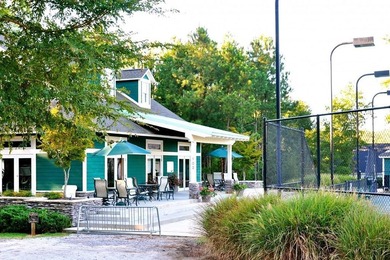 This beautiful home in the gated Grand Harbor community offers a on The Patriot Golf Club At Grand Harbor in South Carolina - for sale on GolfHomes.com, golf home, golf lot