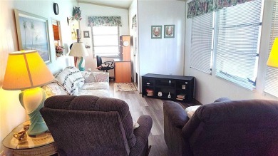 Best value in this park! This vibrant 55+ community provides on River Run Golf Links in Florida - for sale on GolfHomes.com, golf home, golf lot