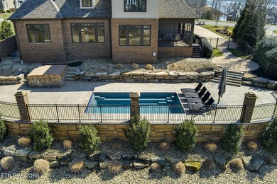 Nestled in the prestigious WindRiver gated lake and golf on Wind River Golf Course in Tennessee - for sale on GolfHomes.com, golf home, golf lot