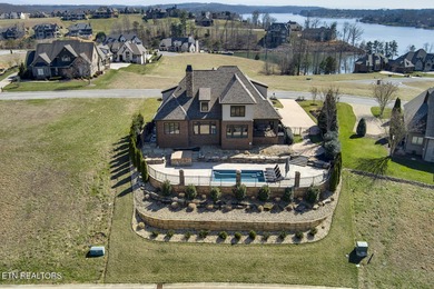 Nestled in the prestigious WindRiver gated lake and golf on Wind River Golf Course in Tennessee - for sale on GolfHomes.com, golf home, golf lot