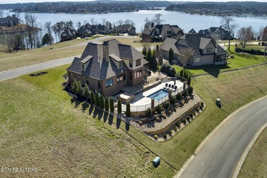 Nestled in the prestigious WindRiver gated lake and golf on Wind River Golf Course in Tennessee - for sale on GolfHomes.com, golf home, golf lot