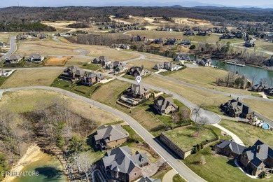 Nestled in the prestigious WindRiver gated lake and golf on Wind River Golf Course in Tennessee - for sale on GolfHomes.com, golf home, golf lot