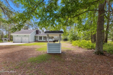 Are you ready for a coastal country cottage you can move right on The Lakes Country Club in North Carolina - for sale on GolfHomes.com, golf home, golf lot