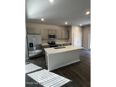 Welcome to The Givens-a thoughtfully designed new construction on Harbour Point Golf Club in North Carolina - for sale on GolfHomes.com, golf home, golf lot