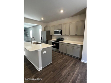 Welcome to The Givens-a thoughtfully designed new construction on Harbour Point Golf Club in North Carolina - for sale on GolfHomes.com, golf home, golf lot