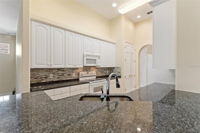 One or more photo(s) has been virtually staged. Stunning Western on Ridgewood Lakes Golf and Country Club in Florida - for sale on GolfHomes.com, golf home, golf lot