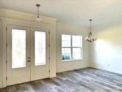 One or more photos are virtually staged. Seller is Very on Pine Ridge Community Golf and Country Club in Florida - for sale on GolfHomes.com, golf home, golf lot