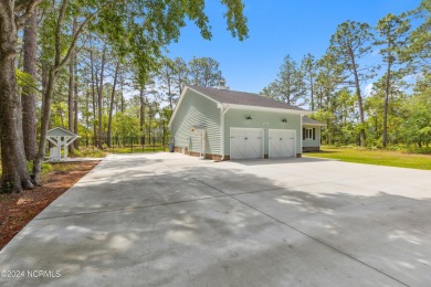 Are you ready for a coastal country cottage you can move right on The Lakes Country Club in North Carolina - for sale on GolfHomes.com, golf home, golf lot