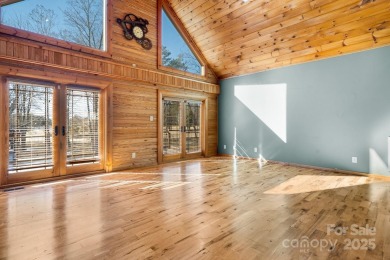 Tucked away in Maiden, this charming log cabin home sits on 1.41 on Glen Oaks Golf and Country Club in North Carolina - for sale on GolfHomes.com, golf home, golf lot