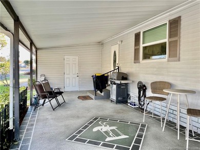 Delightful, remodeled home on a corner lot! Complete storm on Indianwood Golf and Country Club in Florida - for sale on GolfHomes.com, golf home, golf lot