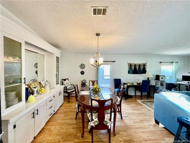 Delightful, remodeled home on a corner lot! Complete storm on Indianwood Golf and Country Club in Florida - for sale on GolfHomes.com, golf home, golf lot