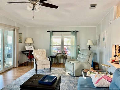 Delightful, remodeled home on a corner lot! Complete storm on Indianwood Golf and Country Club in Florida - for sale on GolfHomes.com, golf home, golf lot