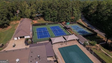 Discover luxurious living with this stunning home in the on Fairfield Plantation Golf and Country Club in Georgia - for sale on GolfHomes.com, golf home, golf lot