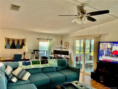 Delightful, remodeled home on a corner lot! Complete storm on Indianwood Golf and Country Club in Florida - for sale on GolfHomes.com, golf home, golf lot