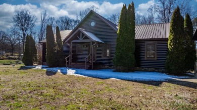 Tucked away in Maiden, this charming log cabin home sits on 1.41 on Glen Oaks Golf and Country Club in North Carolina - for sale on GolfHomes.com, golf home, golf lot