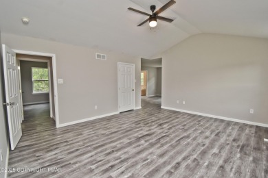 COMPLETELY RENOVATED & MOVE-IN READY! This STUNNING 4bd/2.5ba on Country Club of the Poconos Golf Course in Pennsylvania - for sale on GolfHomes.com, golf home, golf lot