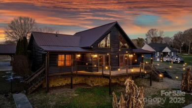 Tucked away in Maiden, this charming log cabin home sits on 1.41 on Glen Oaks Golf and Country Club in North Carolina - for sale on GolfHomes.com, golf home, golf lot