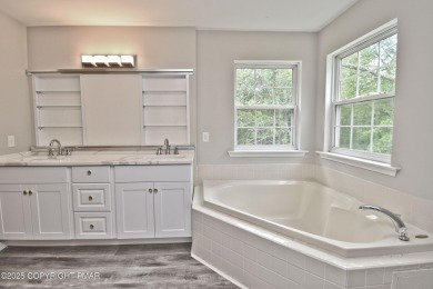 COMPLETELY RENOVATED & MOVE-IN READY! This STUNNING 4bd/2.5ba on Country Club of the Poconos Golf Course in Pennsylvania - for sale on GolfHomes.com, golf home, golf lot