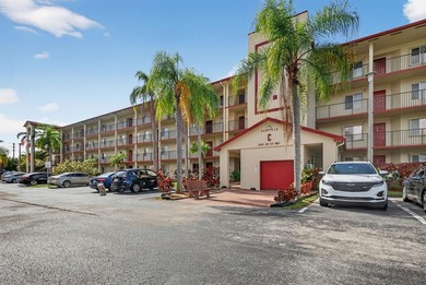 Beautifully renovated and spacious 2-bedroom, 2-bath condo with on Flamingo Lakes Country Club in Florida - for sale on GolfHomes.com, golf home, golf lot