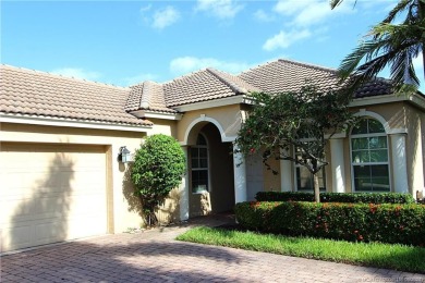 This home is located on a quiet street with the natural settings on Eagle Marsh Golf Club in Florida - for sale on GolfHomes.com, golf home, golf lot