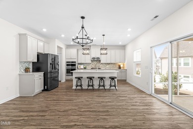 Step into turnkey perfection in the coveted 12 Oaks community on The Club At Twelve Oaks in North Carolina - for sale on GolfHomes.com, golf home, golf lot