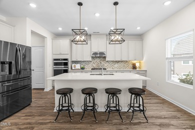 Step into turnkey perfection in the coveted 12 Oaks community on The Club At Twelve Oaks in North Carolina - for sale on GolfHomes.com, golf home, golf lot