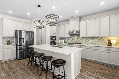 Step into turnkey perfection in the coveted 12 Oaks community on The Club At Twelve Oaks in North Carolina - for sale on GolfHomes.com, golf home, golf lot