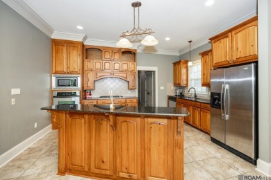 Located on the golf course and water with a new roof and on Copper Mill Golf Club in Louisiana - for sale on GolfHomes.com, golf home, golf lot