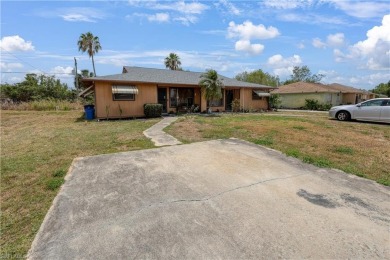 This income-producing duplex is located in San Carlos Park close on Estero Country Club in Florida - for sale on GolfHomes.com, golf home, golf lot