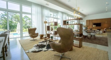 Step inside your private oasis. One of a kind masterpiece on Jonathans Landing At Old Trail  in Florida - for sale on GolfHomes.com, golf home, golf lot