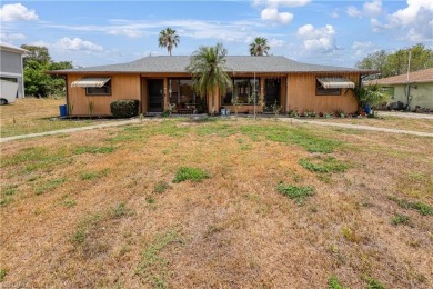 This income-producing duplex is located in San Carlos Park close on Estero Country Club in Florida - for sale on GolfHomes.com, golf home, golf lot