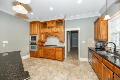 Located on the golf course and water with a new roof and on Copper Mill Golf Club in Louisiana - for sale on GolfHomes.com, golf home, golf lot
