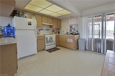 This income-producing duplex is located in San Carlos Park close on Estero Country Club in Florida - for sale on GolfHomes.com, golf home, golf lot