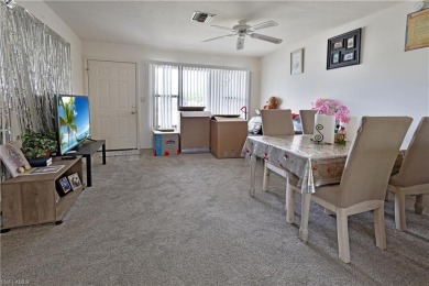 This income-producing duplex is located in San Carlos Park close on Estero Country Club in Florida - for sale on GolfHomes.com, golf home, golf lot