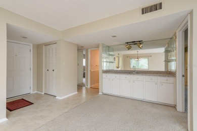Set in the park-like Forestbrook II community, this rare on East Bay Golf Club in Florida - for sale on GolfHomes.com, golf home, golf lot