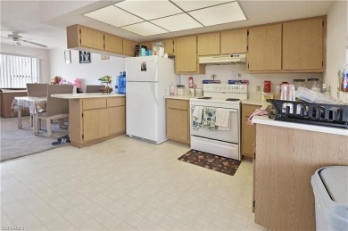 This income-producing duplex is located in San Carlos Park close on Estero Country Club in Florida - for sale on GolfHomes.com, golf home, golf lot
