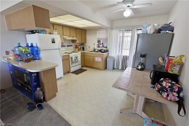 This income-producing duplex is located in San Carlos Park close on Estero Country Club in Florida - for sale on GolfHomes.com, golf home, golf lot