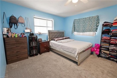 This income-producing duplex is located in San Carlos Park close on Estero Country Club in Florida - for sale on GolfHomes.com, golf home, golf lot