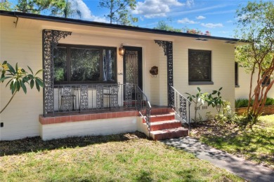 PRICE REDUCED!! ATTENTION: This Lake Hollingsworth mid-century on Cleveland Heights Golf Course in Florida - for sale on GolfHomes.com, golf home, golf lot